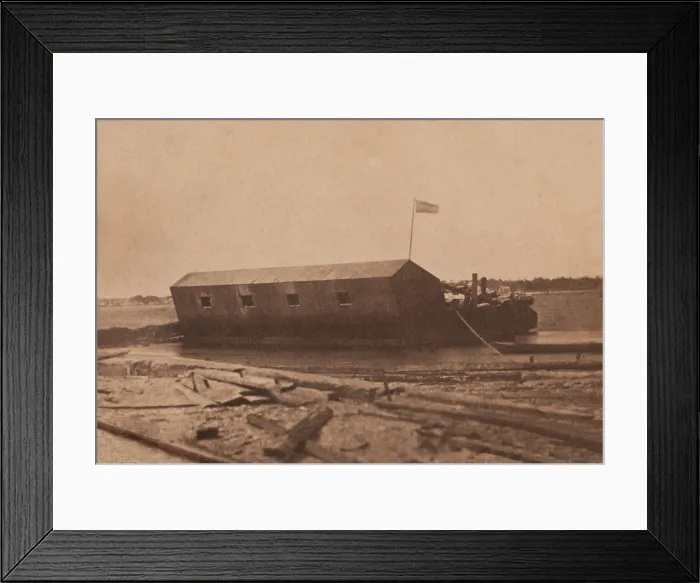 Framed Print : Confederate iron clad floating battery moored at Sullivan's Island on April 11, 1861. The following day it would join the attack on Fort Sumter, April 11, 1861