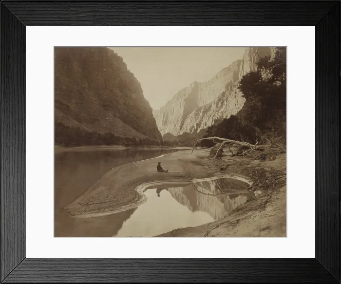 Framed Print : Frederick Samuel Dellenbaugh relaxing on sandbank during John Wesley Powell's second expedition down the Colorado River, 1871-1873