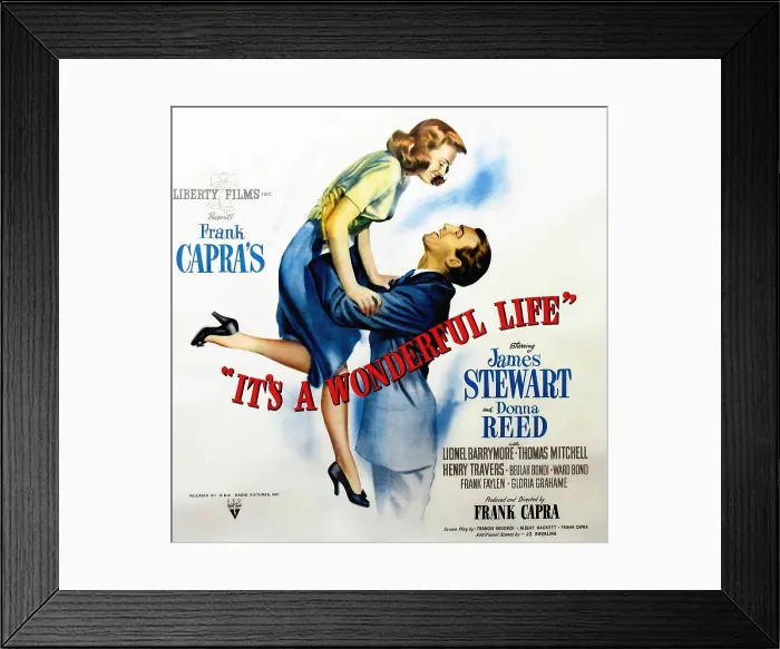 Framed Print : IT'S A WONDERFUL LIFE, l-r: Donna Reed, James Stewart on poster art, 1946