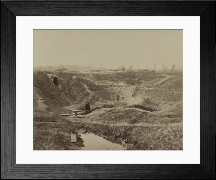 Framed Print : US Civil War. Petersburg Campaign, June 9, 1864 to March 25, 1865. A Union soldier sits within the depression of the crater blown out on July 30, 1864
