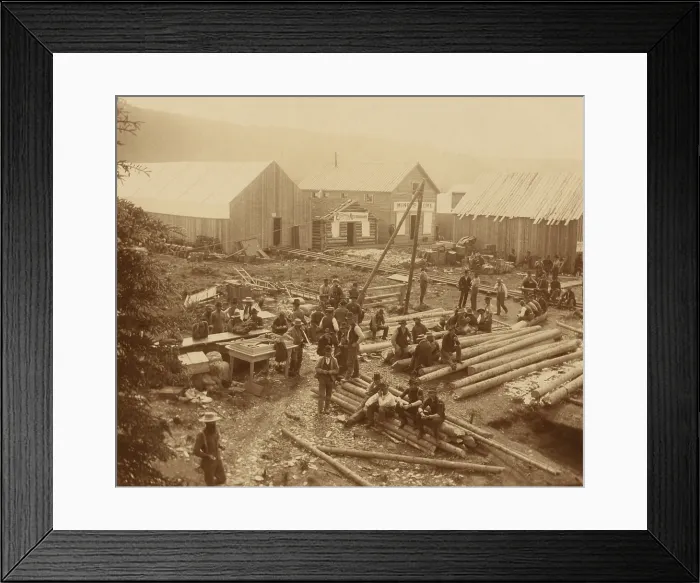 Framed Print : Men, likely out of luck gold seekers, taking a break on a construction site in Dawson City, 1897. The Gold Rush town's population reached 40, 000 in 1898