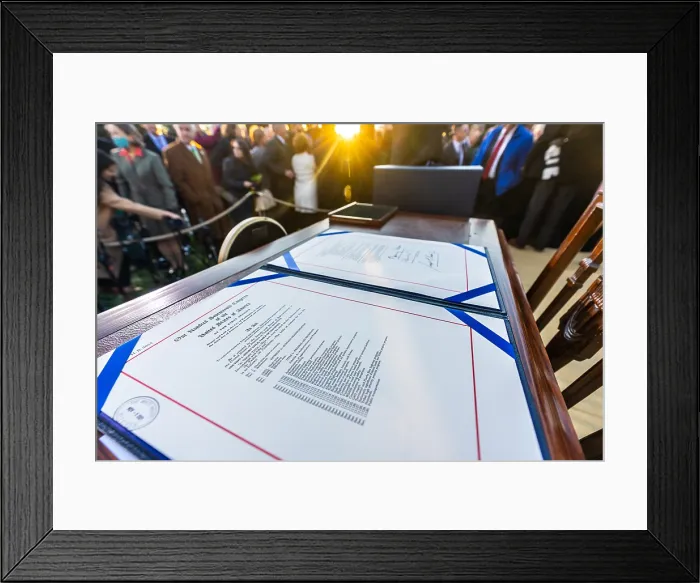 Framed Print : The signed copy of the Infrastructure Investment and Jobs Act is displayed after the signing ceremony on South Lawn of the White House. Nov. 15, 2021 (BSLOC_2021_14_38) Framed Print : The signed copy of the Infrastructure Investment and Jobs Act is displayed after the signing ceremony on South Lawn of the White House. Nov. 15, 2021 (BSLOC_2021_14_38)