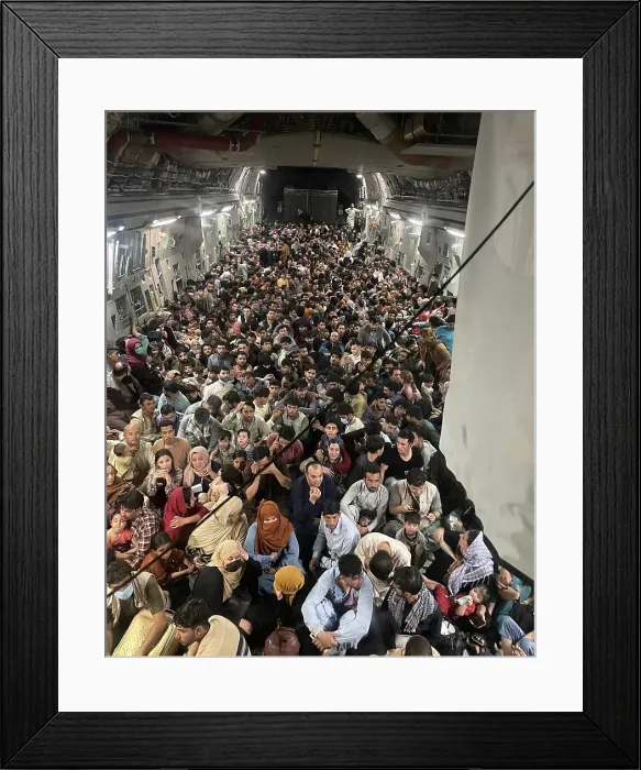 Framed Print : 823 Afghan refugees inside a US Air Force C-17 enroute from Kabul to Qatar on Aug. 15, 2021