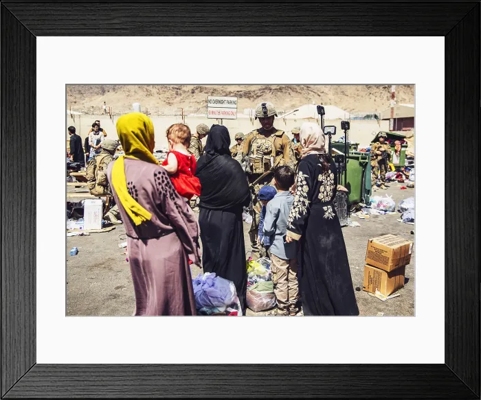 Framed Print : US Marines process women and children Afghan evacuees at Kabul airport, Afghanistan, Aug. 28, 2021