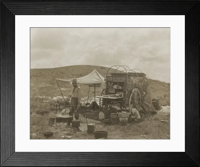 Framed Print : A cowboy cooks at a chuck wagon, getting dinner underway in the American southwest. 1908 photo by Edwin E. Smith (BSLOC_2018_3_62) Framed Print : A cowboy cooks at a chuck wagon, getting dinner underway in the American southwest. 1908 photo by Edwin E. Smith (BSLOC_2018_3_62)