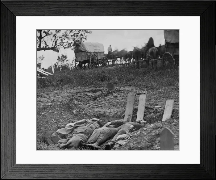 Framed Print : US Civil War. Aftermath of the Battle of Gettysburg, July 1-3, 1863. Confederate soldiers uncovered bodies lie with wood markers at their head in unfinished graves Framed Print : US Civil War. Aftermath of the Battle of Gettysburg, July 1-3, 1863. Confederate soldiers uncovered bodies lie with wood markers at their head in unfinished graves