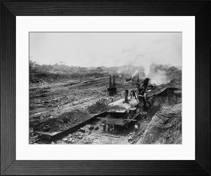 Framed Print : Culebra Cut looking south from West Bank near Cunette, Aug. 1907. Explosives broke up the rock so steam shovels could load it onto railroad cars for transit to dump sites