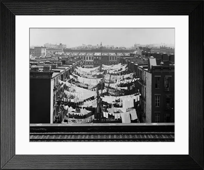 Framed Print : Clothes drying on lines between New York City tenements at Park Avenue and 107th Street. In the foreground are the tracks of an elevated railroad, c. 1900 (BSLOC_2018_3_94) Framed Print : Clothes drying on lines between New York City tenements at Park Avenue and 107th Street. In the foreground are the tracks of an elevated railroad, c. 1900 (BSLOC_2018_3_94)