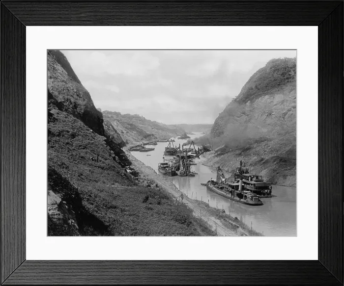 Framed Print : Dredges and cleaning up after one of the frequent landslides in the Culebra Cut, c. 1912-1914
