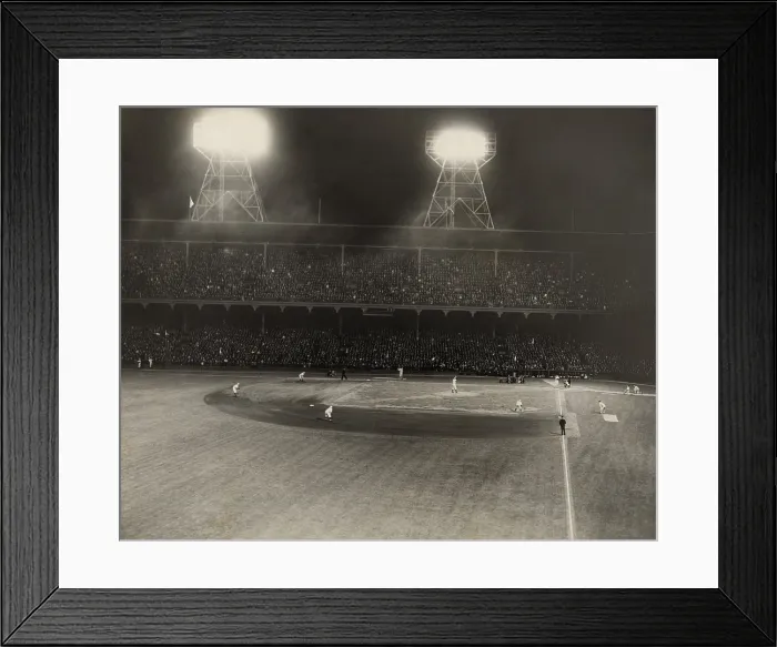 Framed Print : Night baseball at Ebbets Field in Brooklyn, with the Dodgers playing the Cincinnati Reds. Flood lights on towers illuminate the field in the 1940s. (BSLOC_2018_4_120)