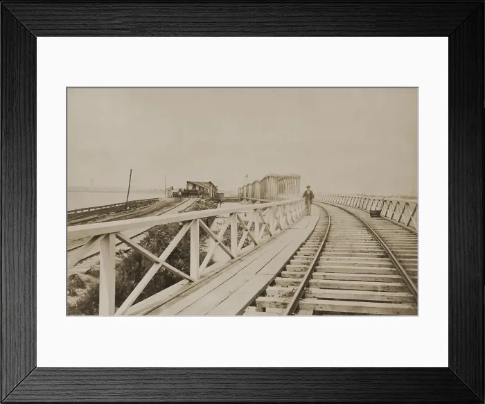 Framed Print : The new span (right) of the Long Bridge between Washington, DC, and Alexandria, VA, under construction in 1863. Civil War transport required this stronger and more secure bridge