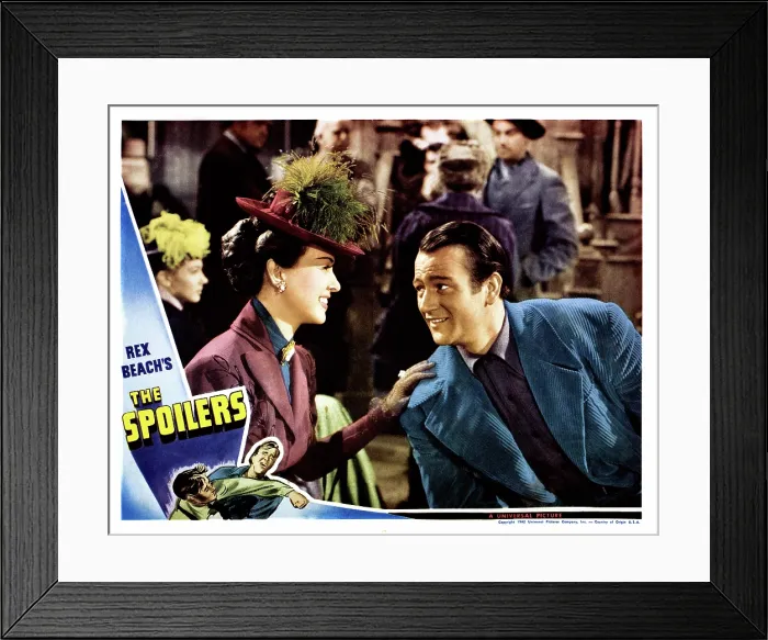 Framed Print : THE SPOILERS, from left: Margaret Lindsay, John Wayne, lobbycard, 1942 Framed Print : THE SPOILERS, from left: Margaret Lindsay, John Wayne, lobbycard, 1942