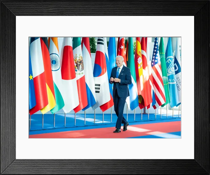 Framed Print : President Joe Biden walks past the flags of the G20 member nations as he arrives at La Nuvola Convention Center in Rome for the G20 summit, Oct. 30, 2021 (BSLOC_2021_15_20)