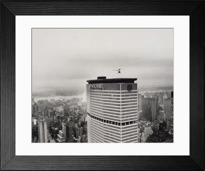 Framed Print : A helicopter test flight hovers over the rooftop heliport of the Pan Am Building in Manhattan, New York City, May 27, 1964