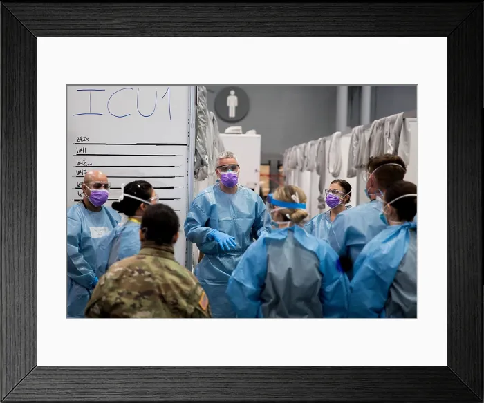 Framed Print : Army Maj. Sean Shirley, holds a staff meeting at the Javits New York Medical Station intensive care unit, New York City
