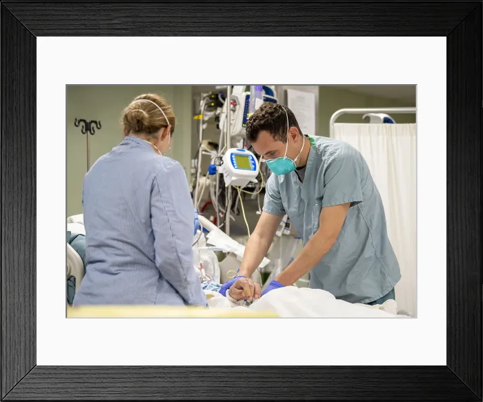Framed Print : Navy Lt. Wade Miller treats a patient aboard the USNS Mercy in Los Angeles, April 4, 2020 Framed Print : Navy Lt. Wade Miller treats a patient aboard the USNS Mercy in Los Angeles, April 4, 2020