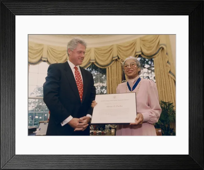 Framed Print : Rosa Parks receives the Presidential Medal of Freedom from President Bill Clinton, Sept. 14, 1996. The African American NAACP activist ignited the Montgomery Bus Boycott on Dec