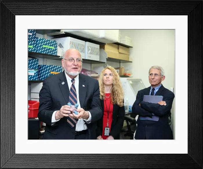 Framed Print : Dr. Robert Redfield learns about universal flu vaccine development at the Vaccine Research Center of the NIH, June 12, 2018. At right is Dr. Anthony Fauci, Director of NIAID