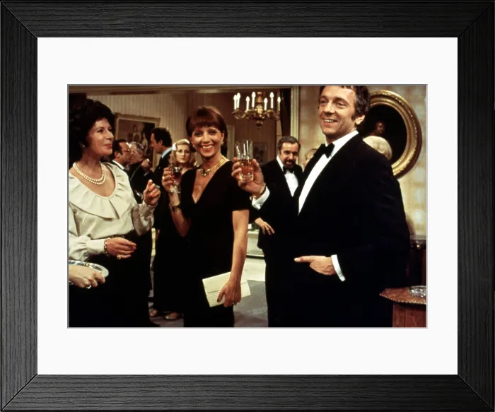 Framed Print : THE DISCREET CHARM OF THE BOURGEOISIE, (aka LE CHARME DISCRET DE LA BOURGEOISIE), Stephane Audran (center, black dress), Fernando Rey (background, goatee)