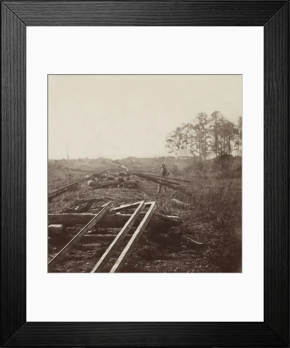 Framed Print : US Civil War. Atlanta, Georgia, Oct. 1864. Union soldier inspecting the destruction of Confederate railroad tracks and telegraph lines