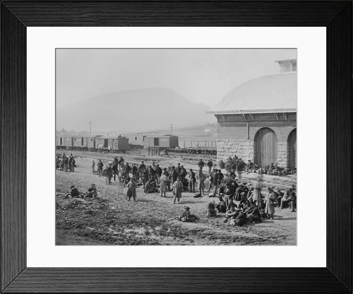 Framed Print : Confederate Prisoners, awaiting transport to detention at the Chattanooga, TN, railroad station