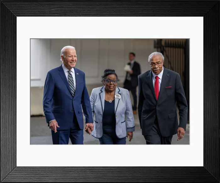Framed Print : President Joe Biden walks with Amos Smith, Emmet Till's cousin, and Viola Fletcher, a witness to the 1921 Tulsa race riot, also called the Tulsa race massacre