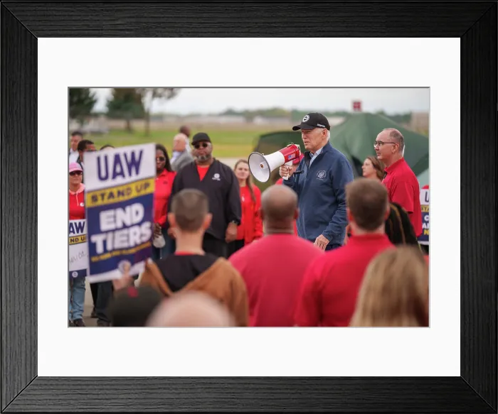 Framed Print : President Joe Biden addresses UAW members walking a picket line at the GM Willow Run Distribution Center, September 26, 2023, in Belleville, Michigan. (BSLOC_2023_8_42) Framed Print : President Joe Biden addresses UAW members walking a picket line at the GM Willow Run Distribution Center, September 26, 2023, in Belleville, Michigan. (BSLOC_2023_8_42)