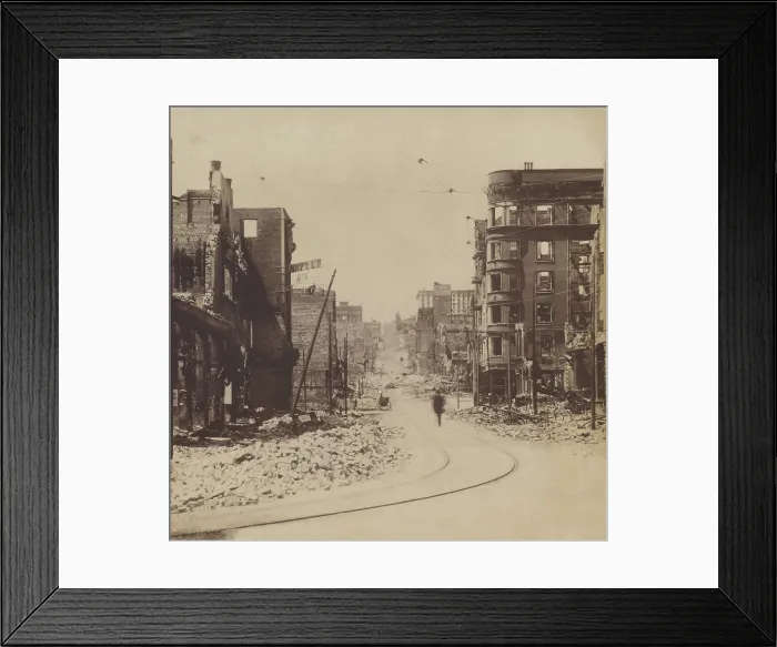 Framed Print : A man walks on Mason St. after the April 18, 1906, San Francisco earthquake and fire. The photo taken from Market St