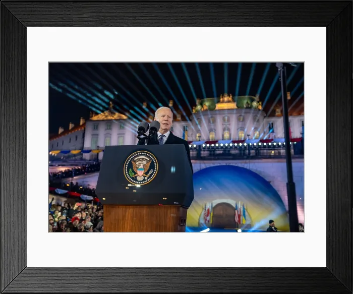 Framed Print : President Joe Biden speaks to an audience which included some of the 1 million Ukrainian refugees sheltered in Poland, Feb. 21, 2023