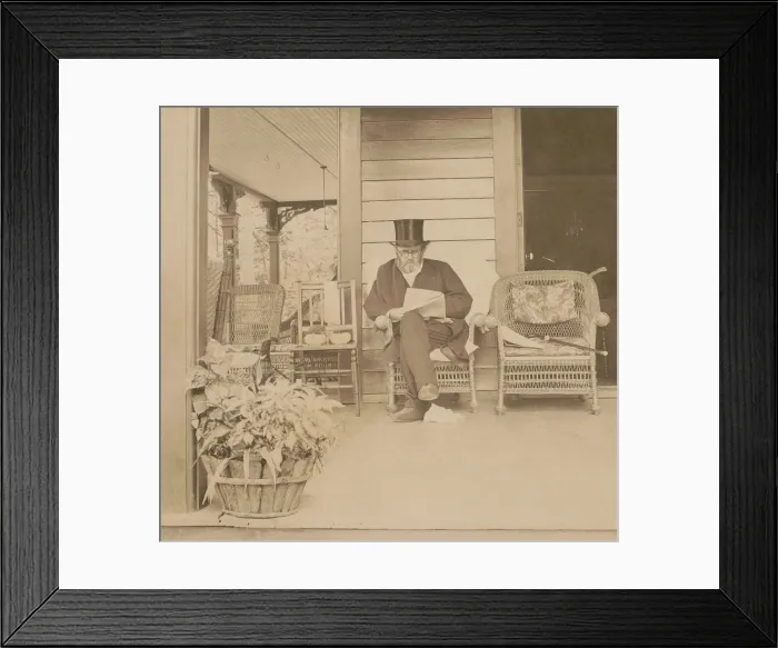 Framed Print : Ulysses S. Grant reading a newspaper at his home in Mount McGregor, New York