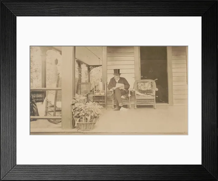 Framed Print : Ulysses S. Grant reading a newspaper at his home in Mount McGregor, New York