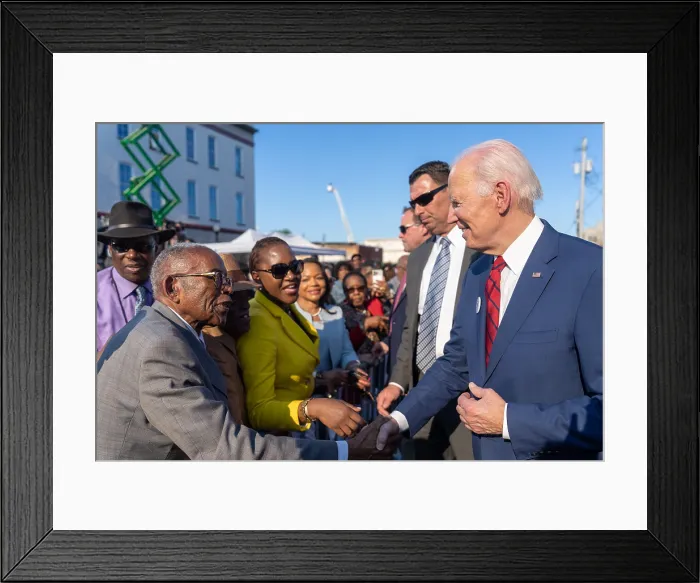 Framed Print : President Joe Biden shakes hands with 92 year-old civil rights attorney and 2022 Presidential Medal of Freedom recipient Fred Gray