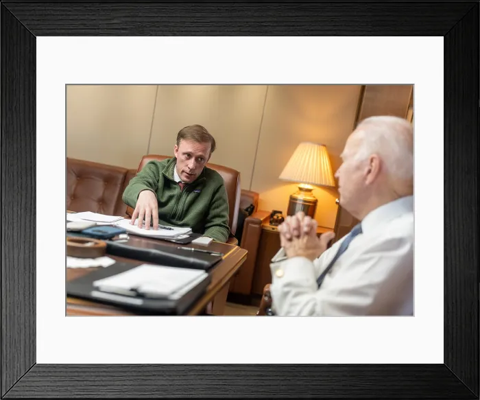 Framed Print : President Joe Biden works with National Security Adviser Jake Sullivan aboard Air Force One, March 13, 2023, en route to the Naval Air Station in San Diego, California Framed Print : President Joe Biden works with National Security Adviser Jake Sullivan aboard Air Force One, March 13, 2023, en route to the Naval Air Station in San Diego, California
