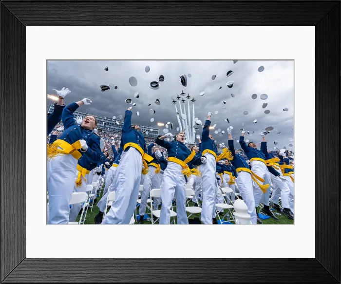 Framed Print : US Air Force Academy Cadets toss their hats in the air as the Thunderbirds formation flies over the Air Force Academy, June 1, 2023, in Colorado Springs