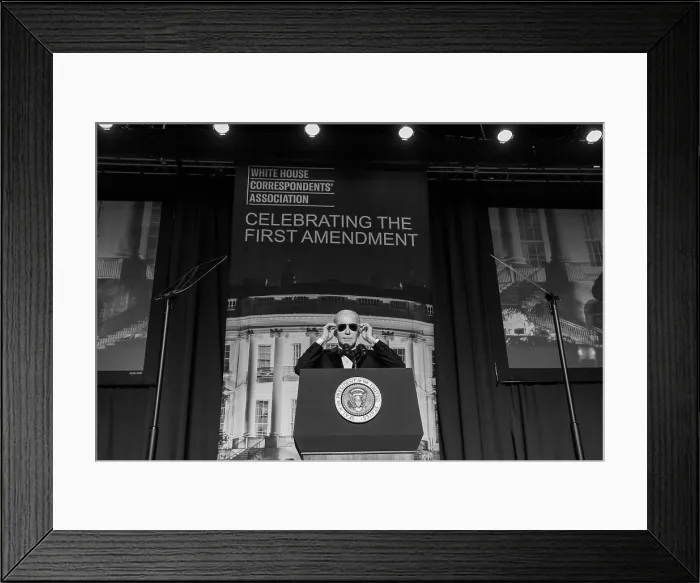 Framed Print : President Joe Biden puts on his aviator sunglasses after making a joke about the Dark Brandon persona at the 2023 White House Correspondents Association dinner