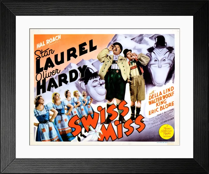 Framed Print : SWISS MISS, from left: Oliver Hardy, Stan Laurel on title lobbycard, 1938