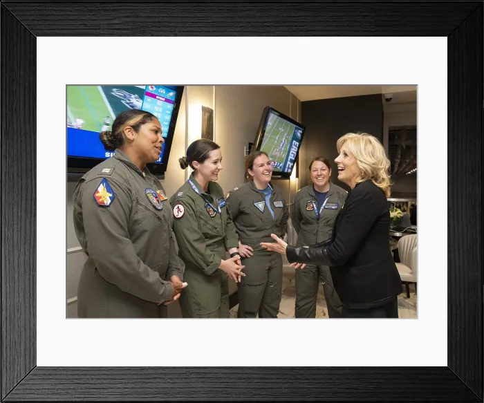 Framed Print : First Lady Jill Biden greets female US military pilots who participated in the pre-game all-women flyover at the Super Bowl, Phoenix, Arizona, Feb. 12, 2023 (BSLOC_2023_6_60) Framed Print : First Lady Jill Biden greets female US military pilots who participated in the pre-game all-women flyover at the Super Bowl, Phoenix, Arizona, Feb. 12, 2023 (BSLOC_2023_6_60)