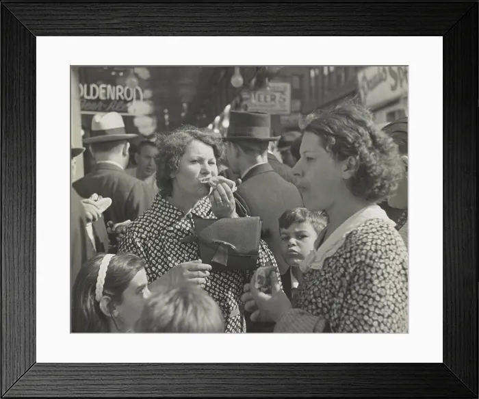 Framed Print : Two women, surrounded by children, eating hot dogs on a crowded street in Coney Island, New York City, 1936 (BSLOC_2020_2_107) Framed Print : Two women, surrounded by children, eating hot dogs on a crowded street in Coney Island, New York City, 1936 (BSLOC_2020_2_107)