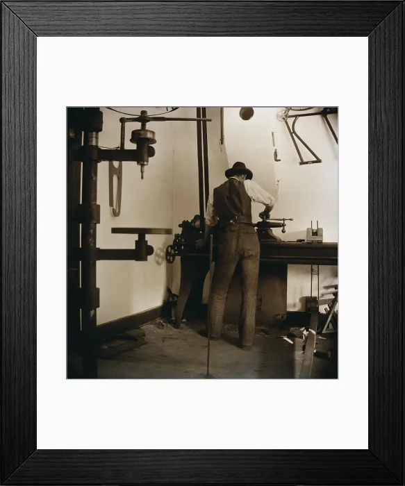 Framed Print : Wilbur Wright works in the bicycle shop at Dayton, Ohio in 1897. The Wright Brothers rented, sold, and manufactured bicycles Framed Print : Wilbur Wright works in the bicycle shop at Dayton, Ohio in 1897. The Wright Brothers rented, sold, and manufactured bicycles