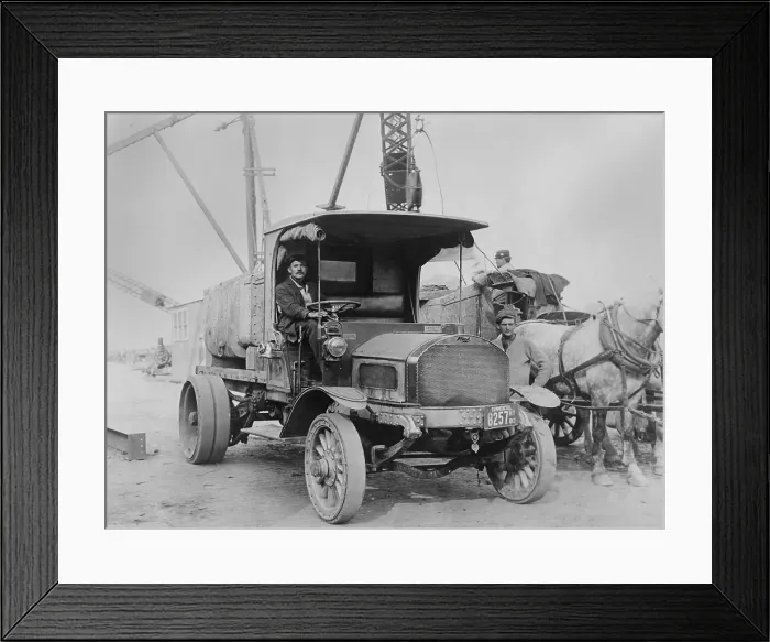 Framed Print : Mack Truck, workers, and horses at a construction site in New York State in 1913. Mack Brothers Company manufactured its first truck in 1907 (BSLOC_2018_2_133)