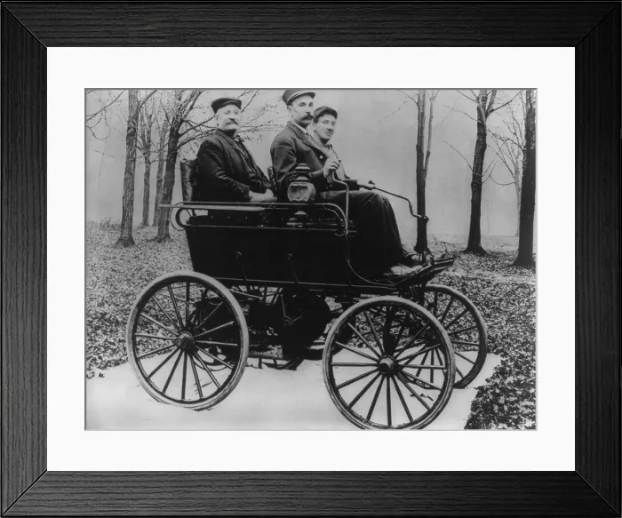 Framed Print : The first Oldsmobile used control sticks for steering in 1897. The Olds Motor Vehicle Co. was founded by Ransom E. Olds in 1897 and purchased by General Motors in 1908