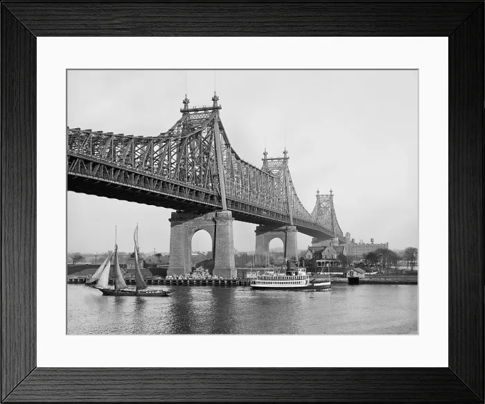 Framed Print : Queensboro Bridge straddling Blackwell's Island c. 1915. It is a double-decker cantilevered bridge with four piers of metal construction Framed Print : Queensboro Bridge straddling Blackwell's Island c. 1915. It is a double-decker cantilevered bridge with four piers of metal construction
