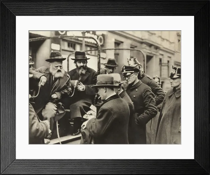 Framed Print : Jewish men stopped and interrogated by police and a Nazi uniformed man, April 12, 1933
