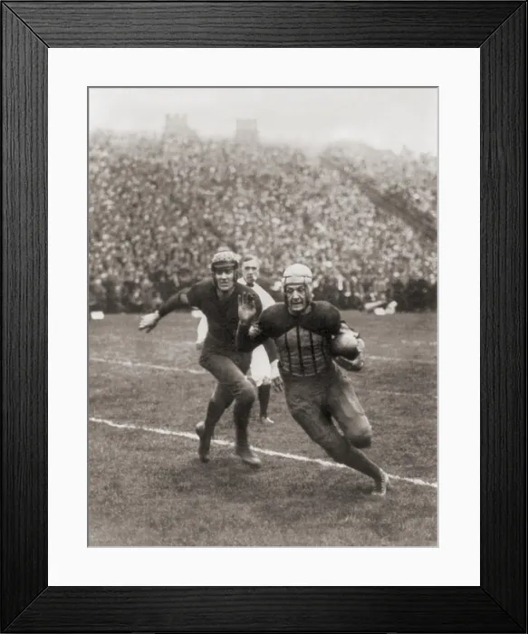 Framed Print : Harold Red Grange carrying football in Illinois-Michigan game, 1925 (BSLOC_2020_2_189) Framed Print : Harold Red Grange carrying football in Illinois-Michigan game, 1925 (BSLOC_2020_2_189)