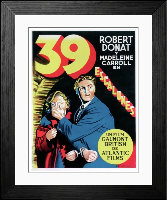 Framed Print : THE 39 STEPS (aka 39 ESCALONES), from left: Madeleine Carroll, Robert Donat on Spanish poster art, 1935 Framed Print : THE 39 STEPS (aka 39 ESCALONES), from left: Madeleine Carroll, Robert Donat on Spanish poster art, 1935