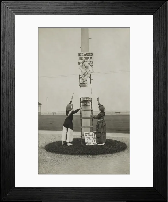 Framed Print : Suffrage campaign days in New Jersey, c. 1915. Three women post a sign advertising a suffrage event featuring Anna Howard Shaw, at Long Branch Casino Framed Print : Suffrage campaign days in New Jersey, c. 1915. Three women post a sign advertising a suffrage event featuring Anna Howard Shaw, at Long Branch Casino