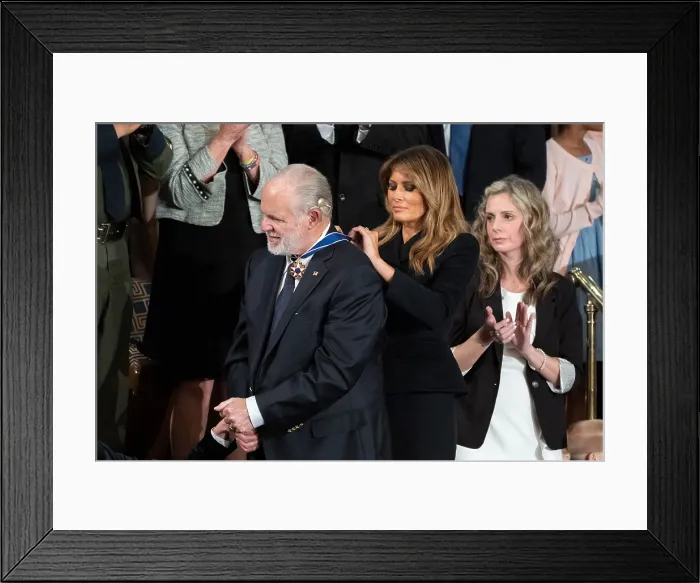 Framed Print : Lady Melania Trump presents the Presidential Medal of Freedom to conservative broadcaster Rush Limbaugh. His wife Kathryn Adams Limbaugh looks