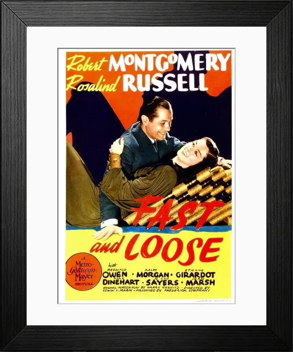 Framed Print : FAST AND LOOSE, from left: Robert Montgomery, Rosalind Russell on midget window card, 1939
