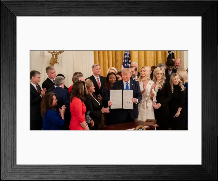 Framed Print : President Donald Trump displays his signature on an Executive Order for Combating Human Trafficking and Online Child Exploitation, Jan. 31, 2020