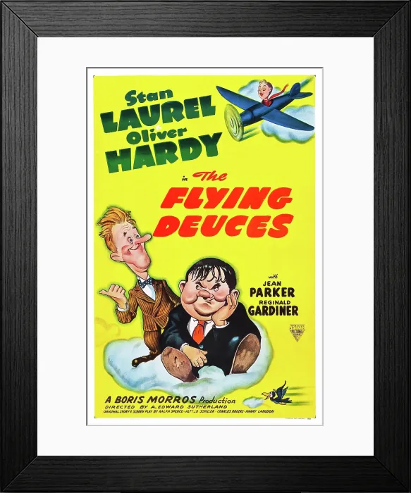 Framed Print : THE FLYING DEUCES, l-r: Stan Laurel, Oliver Hardy on poster art, 1939 Framed Print : THE FLYING DEUCES, l-r: Stan Laurel, Oliver Hardy on poster art, 1939